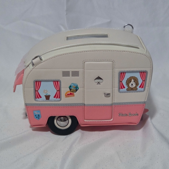 kate spade Handbags - Kate Spade Day Tripper Pink and Cream Camper Crossbody Bag